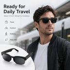 Person wearing BEEVVOS XG89 smart audio glasses with black tinted lenses during an urban commute and outdoor walk